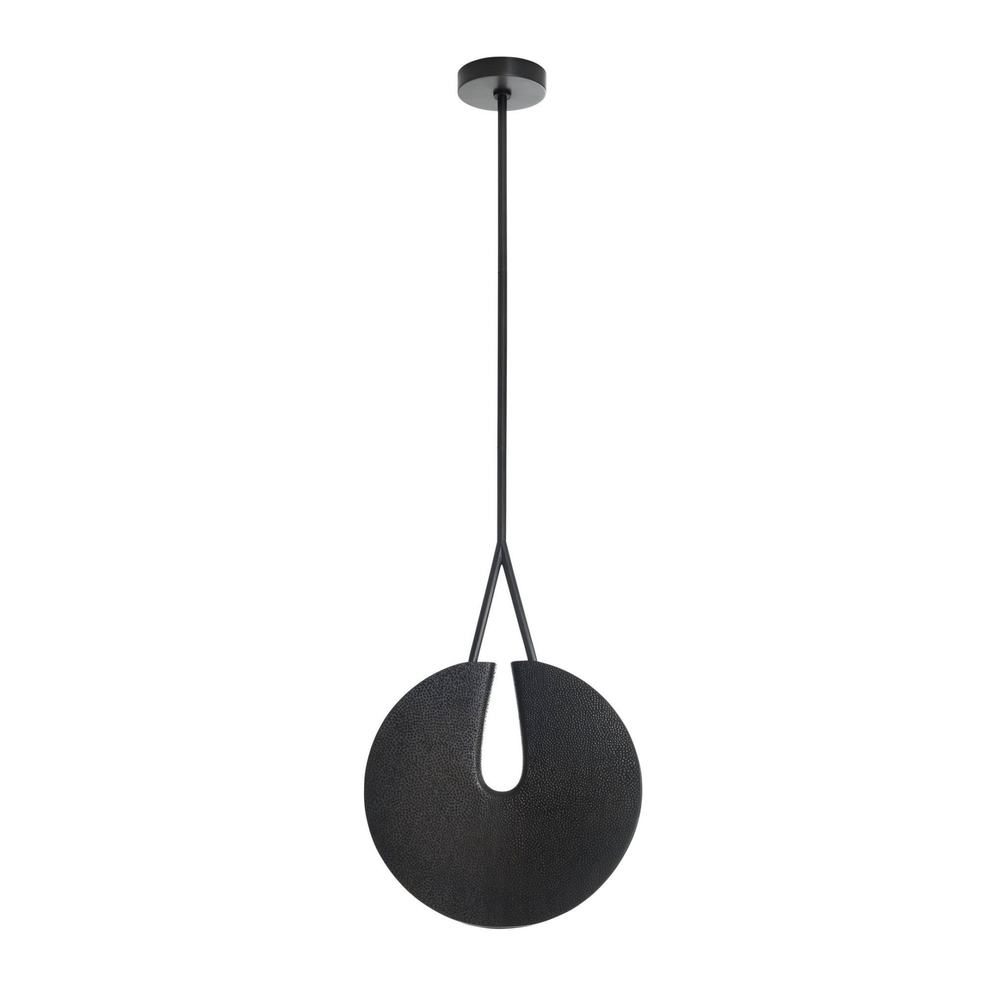 Black pendant light with a white bulb on a white background
