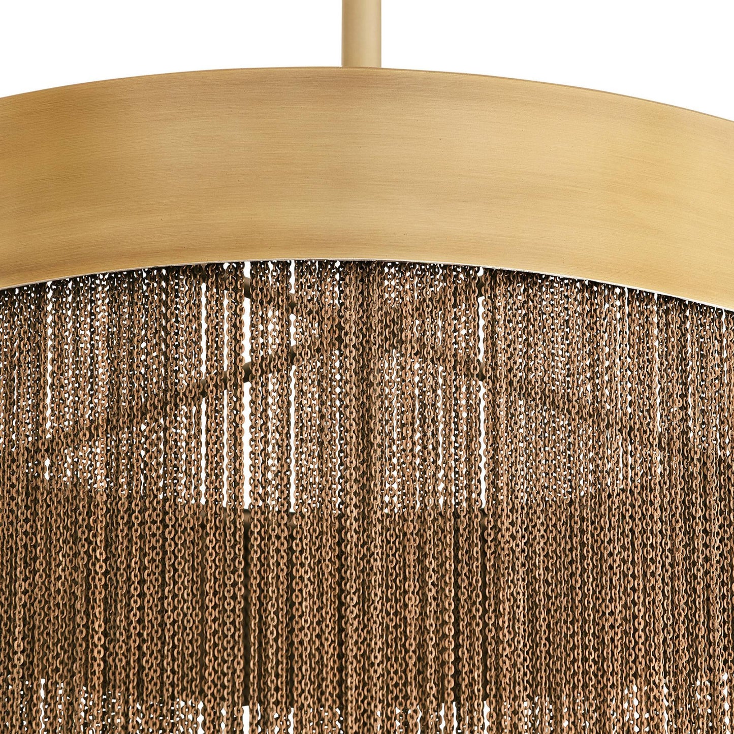 Close-up of a gold pendant light fixture with a textured brown shade.