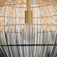 Close-up of a woven rattan lampshade with black accents