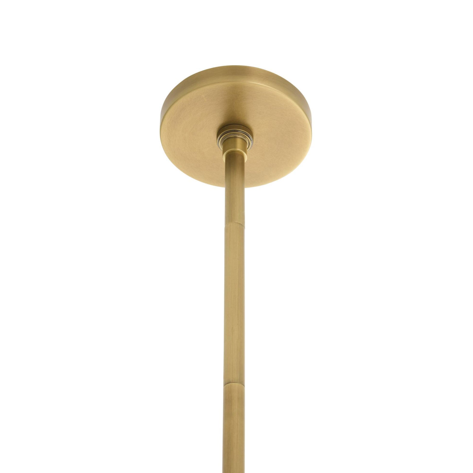 Gold pendant light fixture on a white background