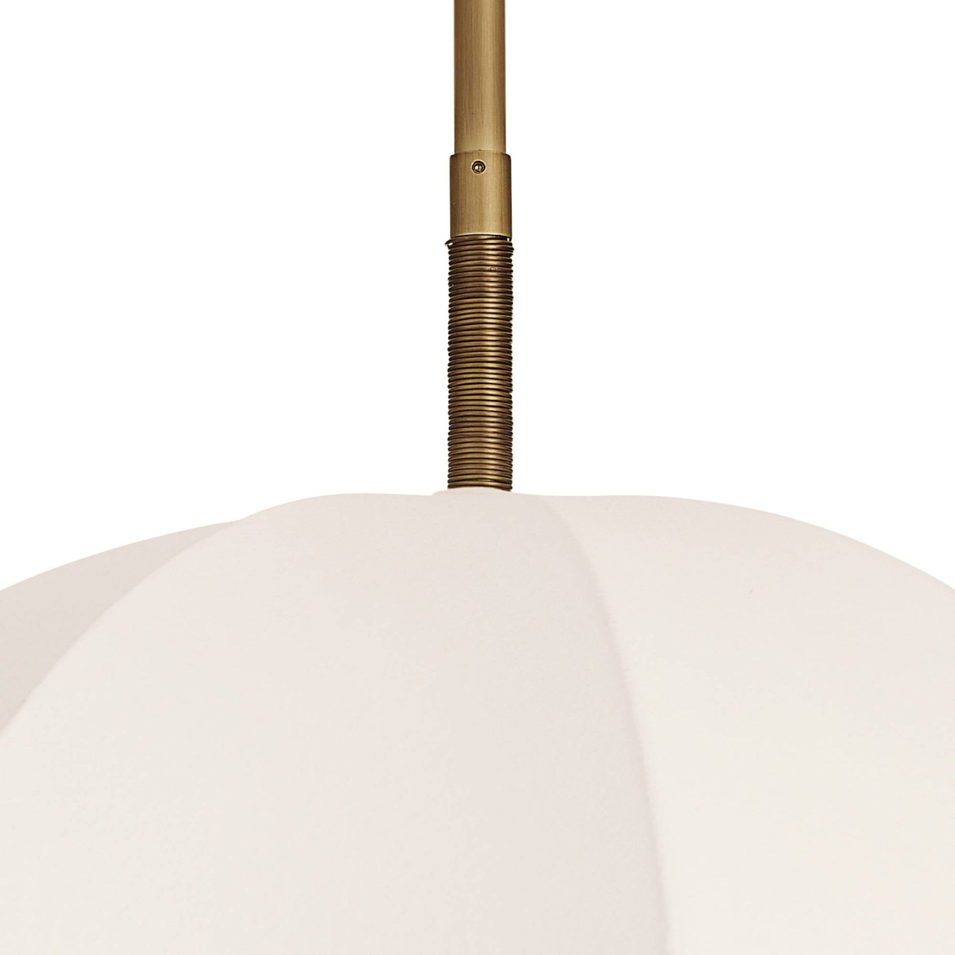 Close-up of a white umbrella with a gold handle on a white background