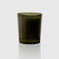 Dark green glass candle holder on a white background