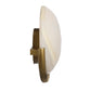Wall sconce with white glass shade and gold metal fixture on a white background