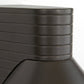 Close-up of a stack of black plastic trays on a white background
