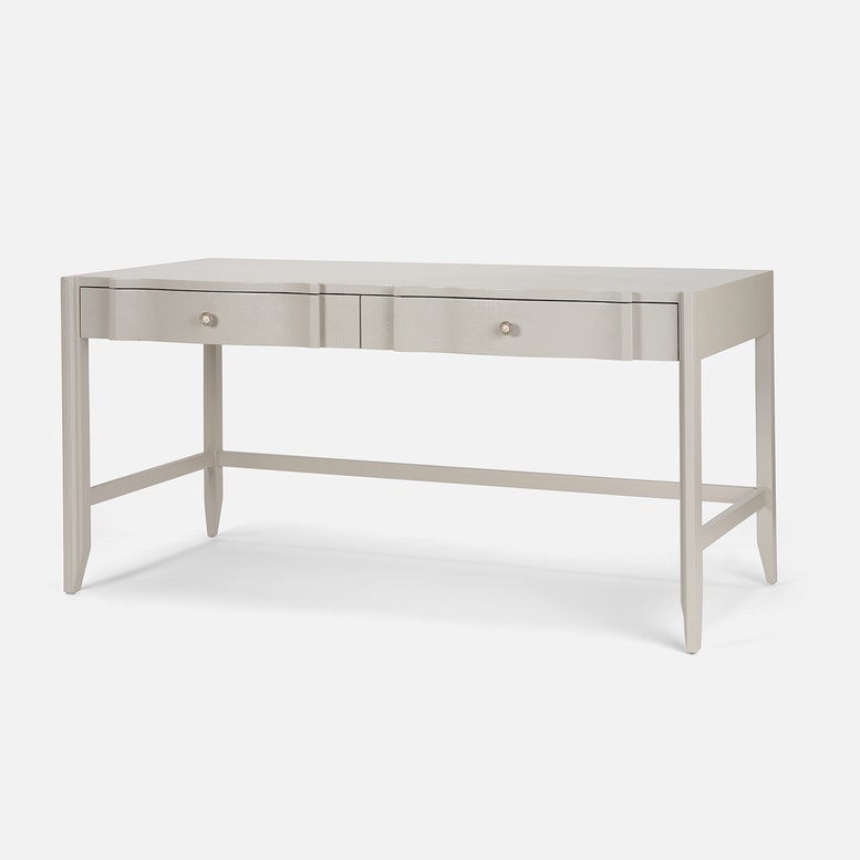 Light gray desk with two drawers on a white background
