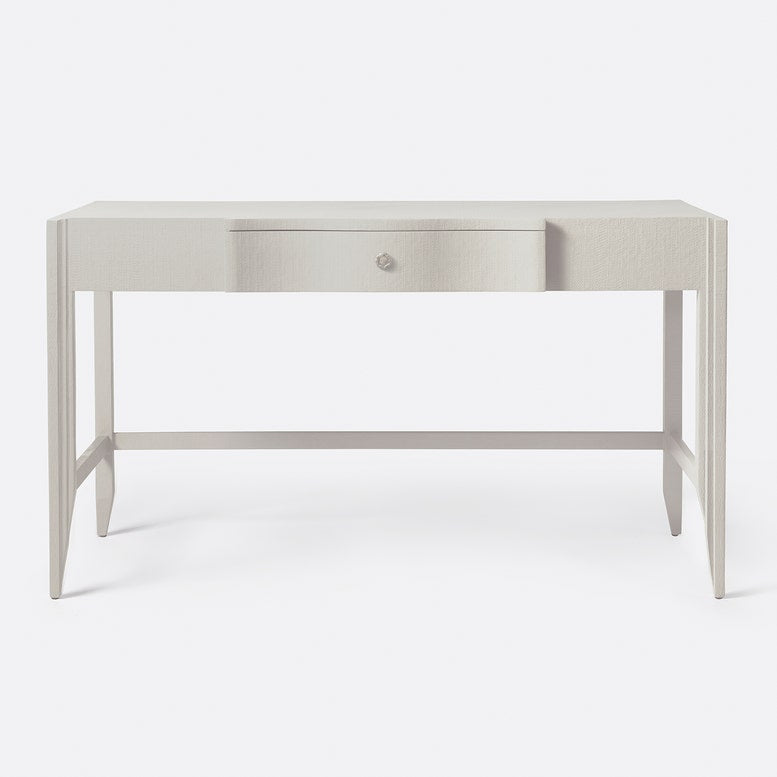 Light gray desk with a single drawer on a white background