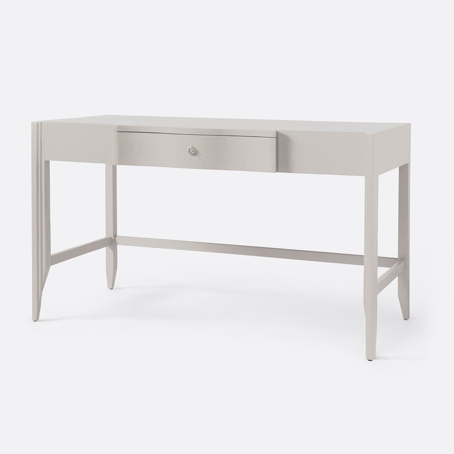 Light gray desk with a drawer on a white background