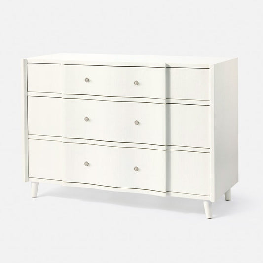 White dresser with four drawers on a white background