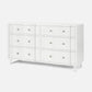 White dresser with multiple drawers on a white background