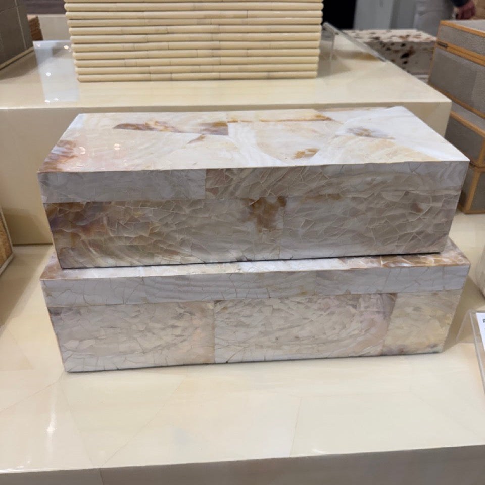Marble-patterned boxes on a display counter