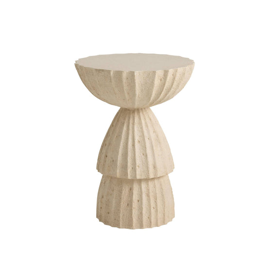 Beige side table with textured design on a white background