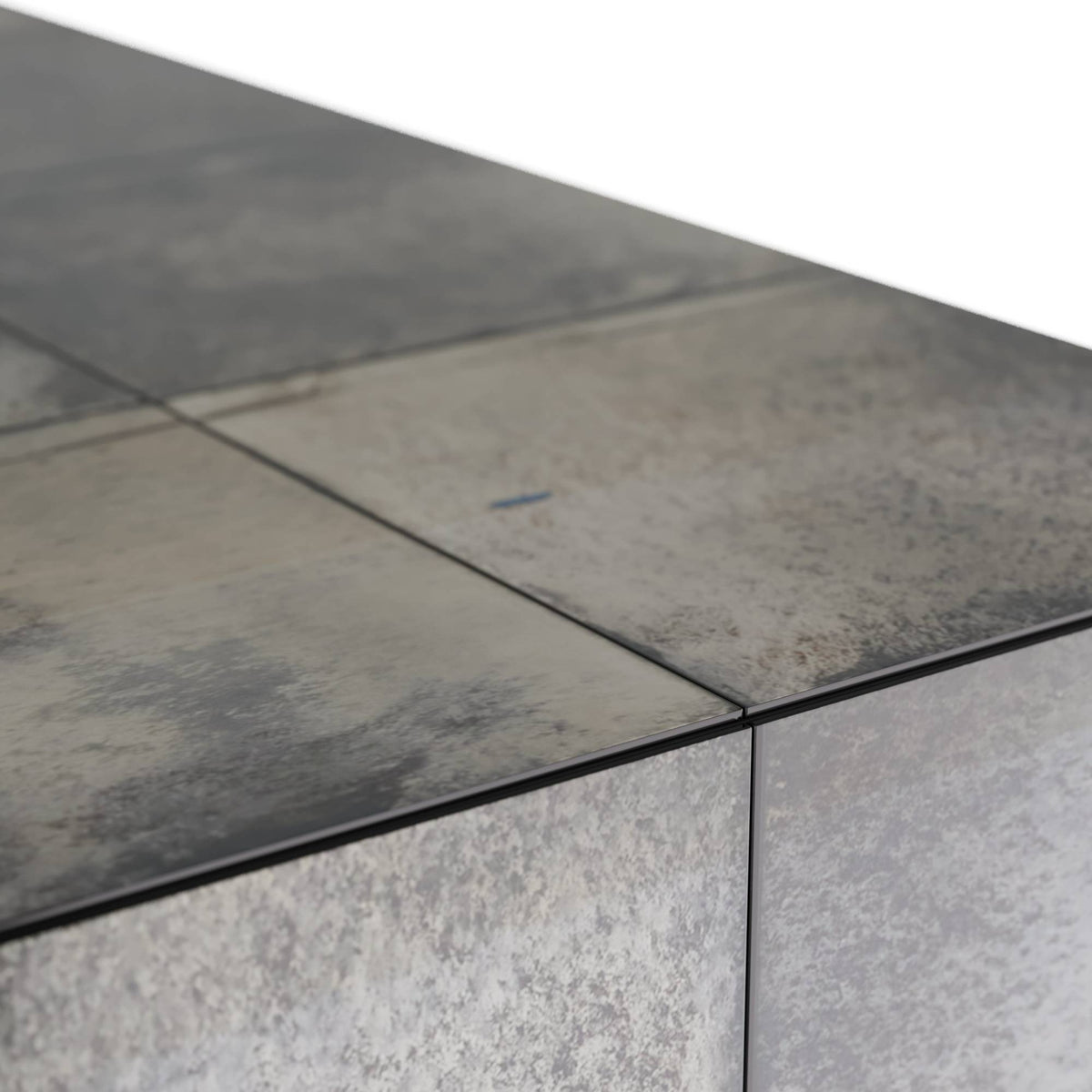 Close-up of a stone countertop with a gray and brown color pattern.