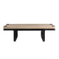 A modern low coffee table with a light natural travertine top and a black metal frame and legs, shown on a plain white background.