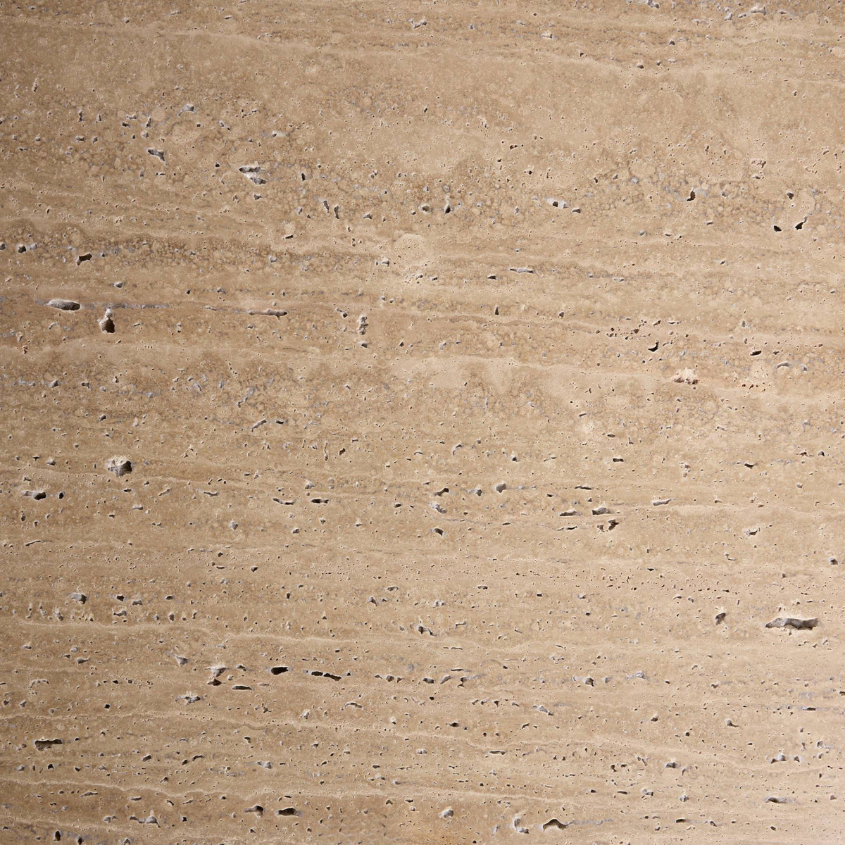 A modern low coffee table with a light natural travertine top and a black metal frame and legs, shown on a plain white background.