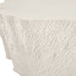 Close-up of a textured white ceramic vase on a white background