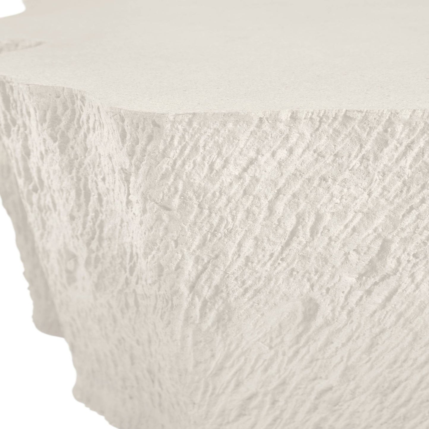 Close-up of a textured white ceramic vase on a white background