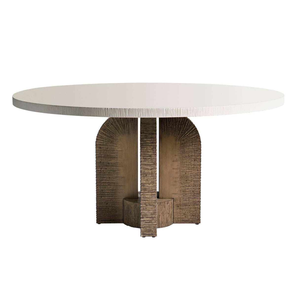 Round outdoor dining table with a white stone top and sculptural textured brown pedestal base.