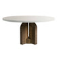 Round outdoor dining table with a white stone top and sculptural textured brown pedestal base.