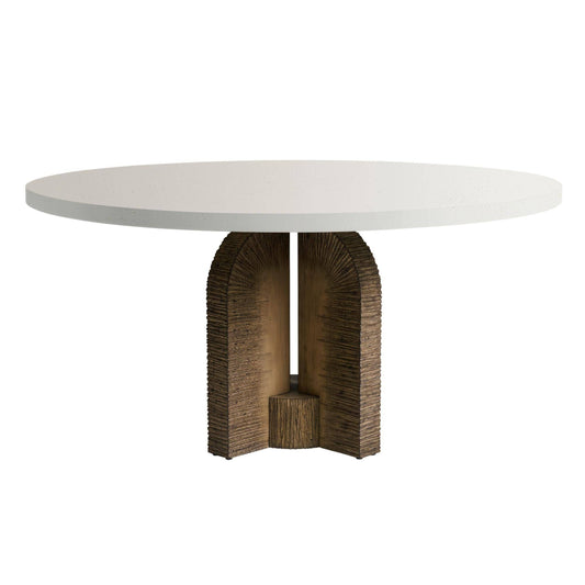 Round outdoor dining table with a white stone top and sculptural textured brown pedestal base.