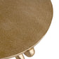 Gold round table with textured surface on a white background