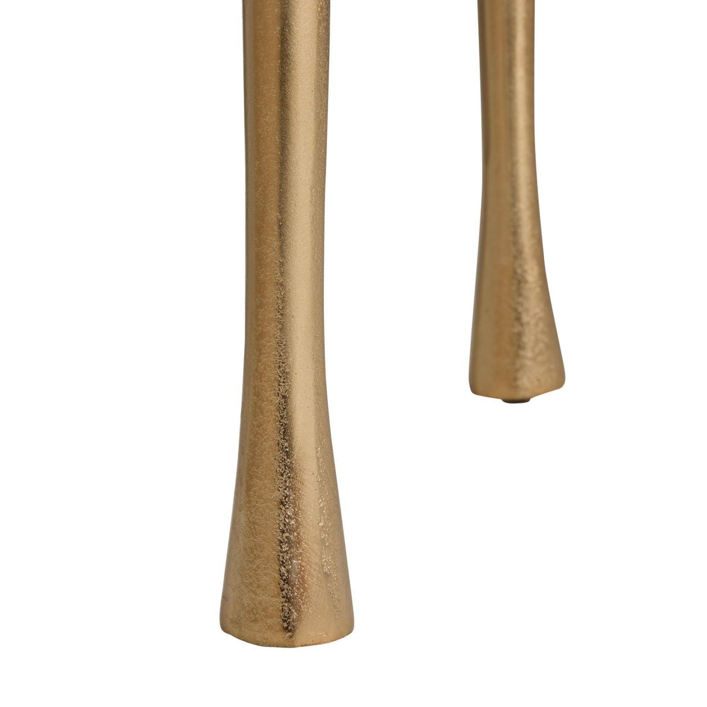 Two gold-colored metal objects on a white background