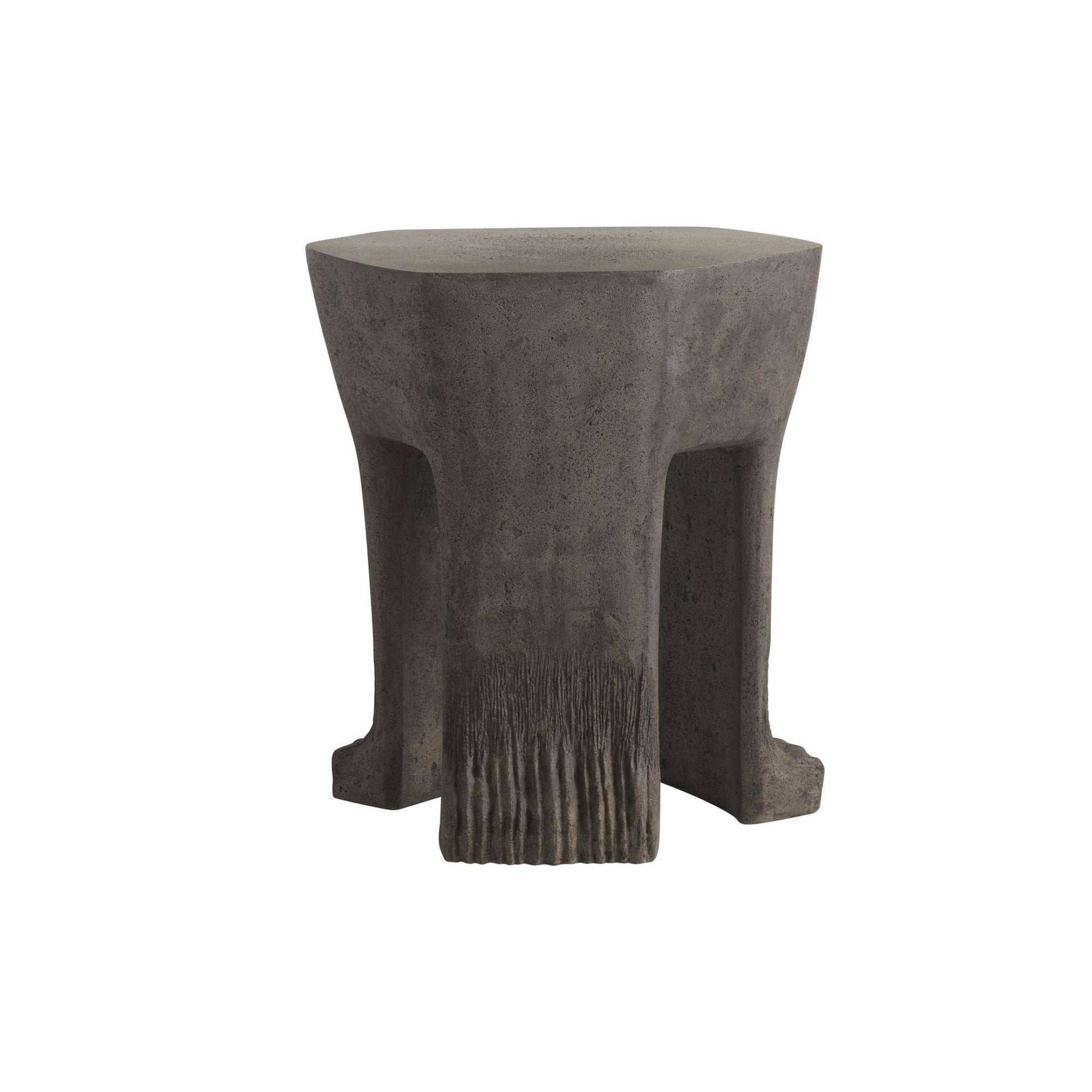 Concrete stool with textured surface on a white background