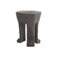Concrete stool with a textured surface on a white background