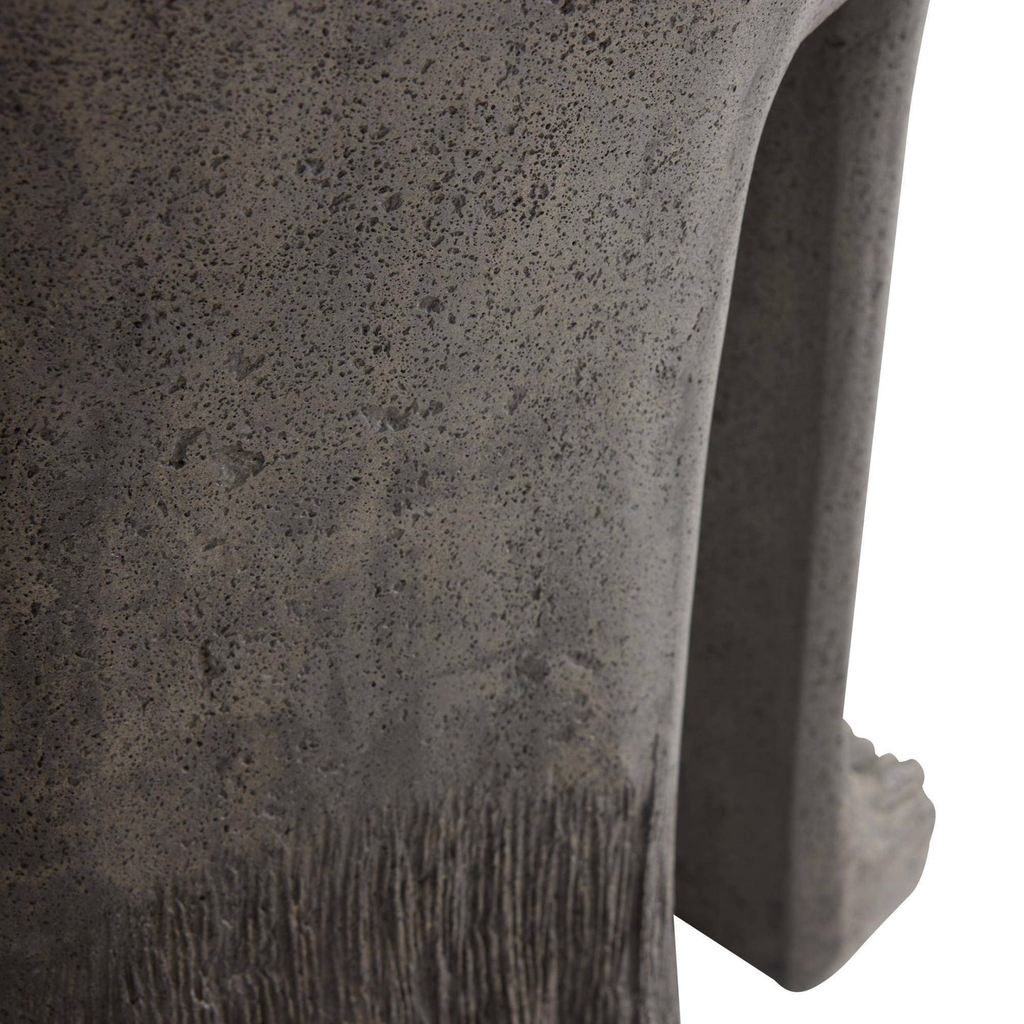 Close-up of a textured stone archway