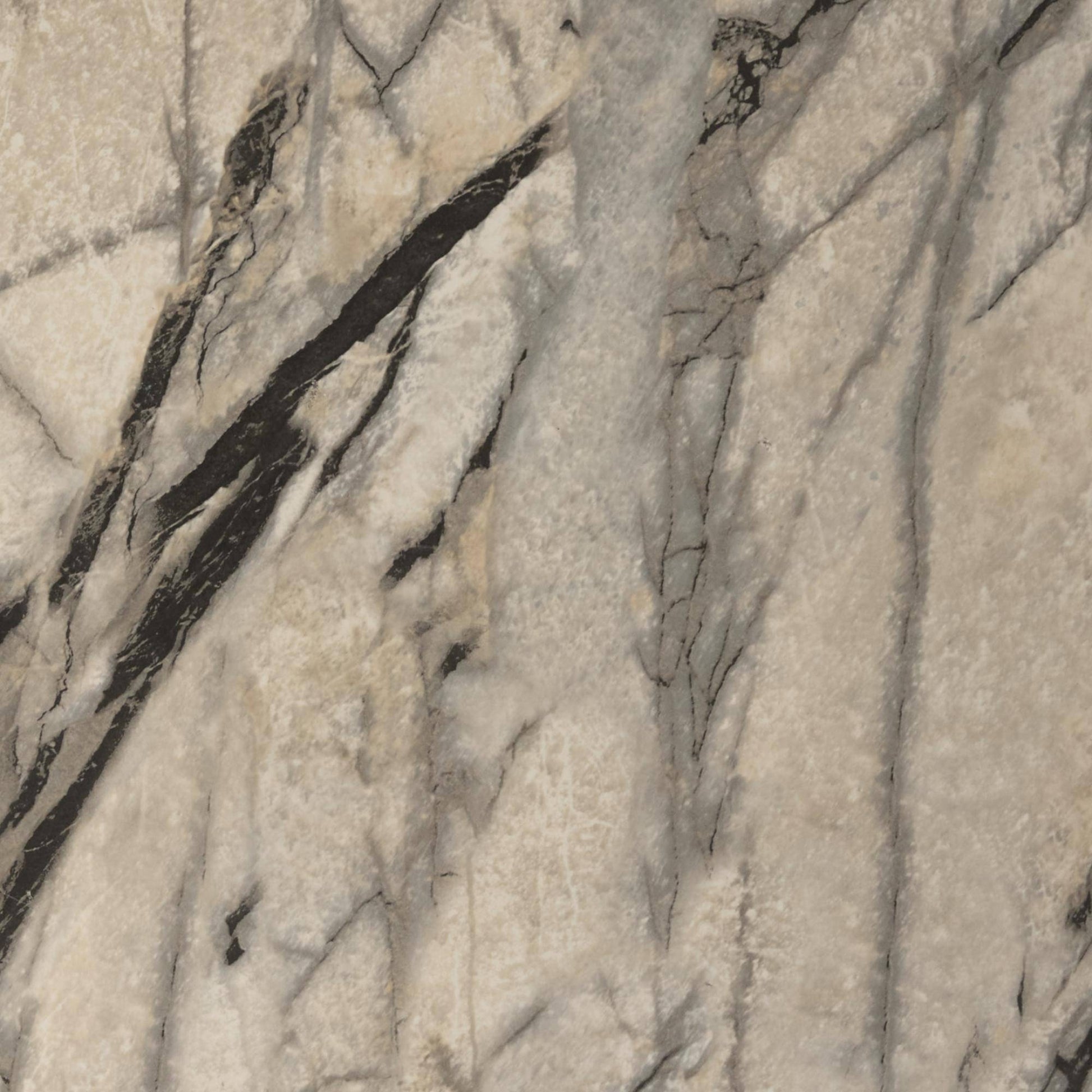 Close-up of a marble-like stone surface with gray and beige tones.