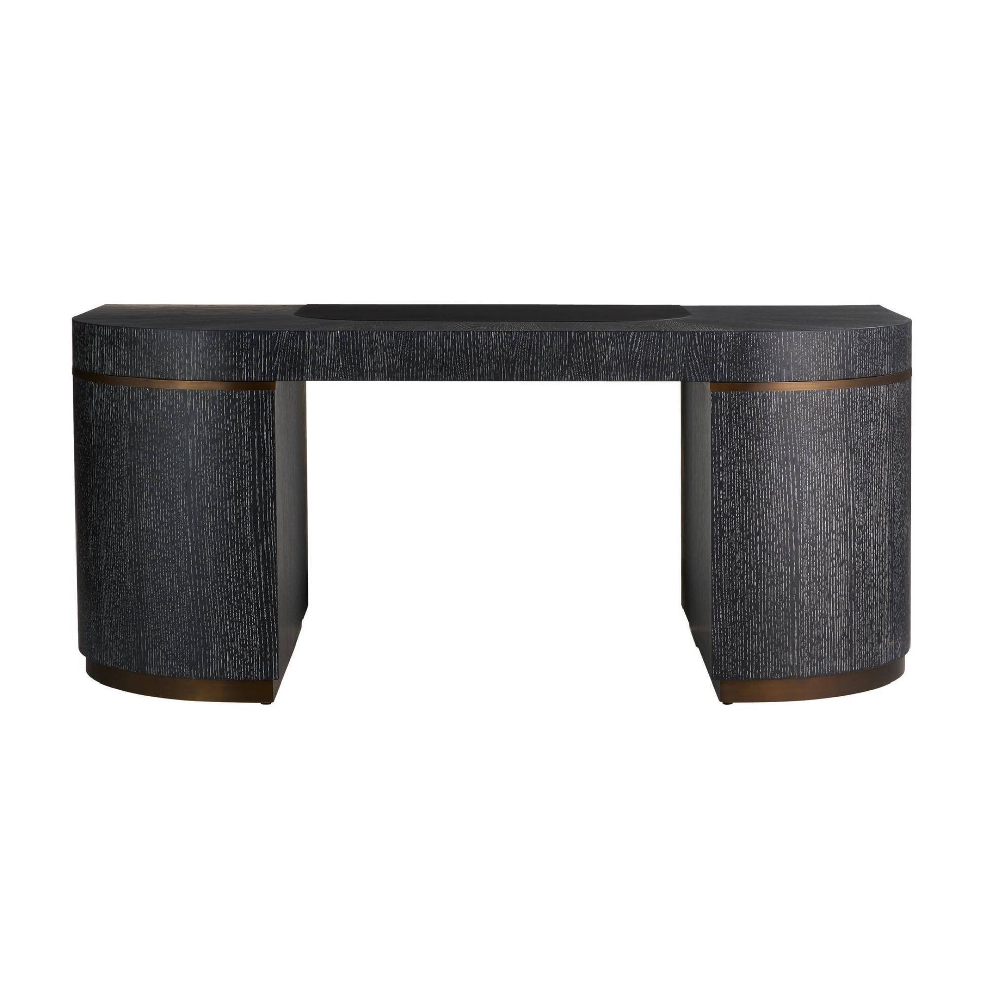 A modern console table with a dark textured finish, featuring cylindrical legs with a thin bronze-gold accent band and a matching dark top surface, shown against a plain white background.