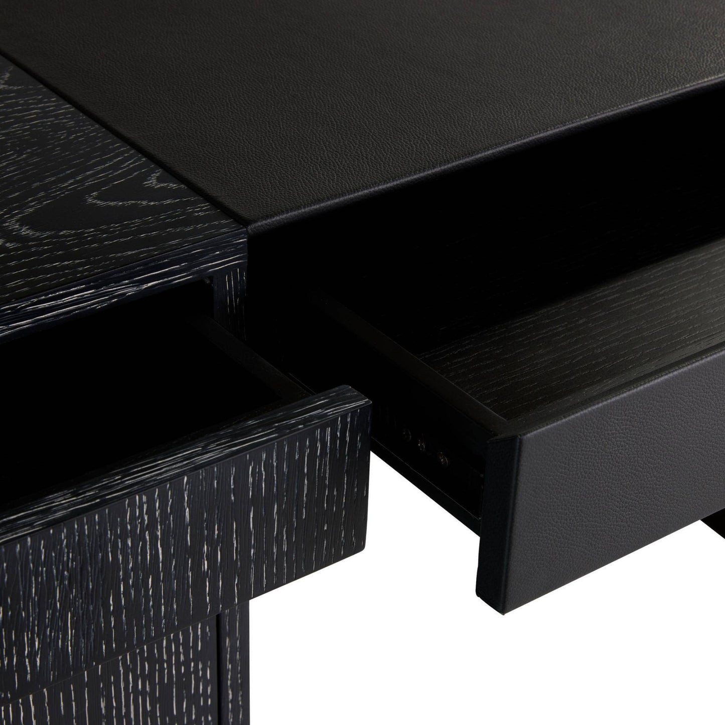 Close-up of a black wooden desk with a drawer open on a white background