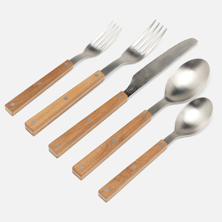 Five-piece flatware set with polished silver metal heads and warm brown wooden handles