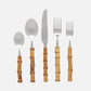 Five-piece flatware set with polished silver metal heads and warm brown wooden bamboo handles