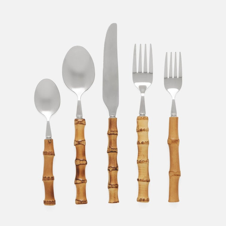 Five-piece flatware set with polished silver metal heads and warm brown wooden bamboo handles