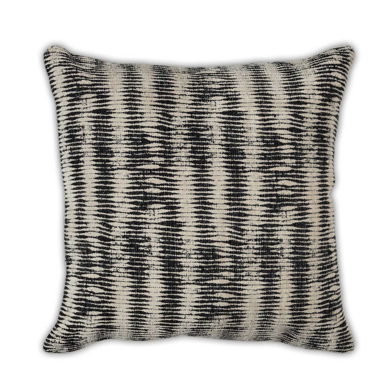 Textured pillow with black and white pattern on a white background
