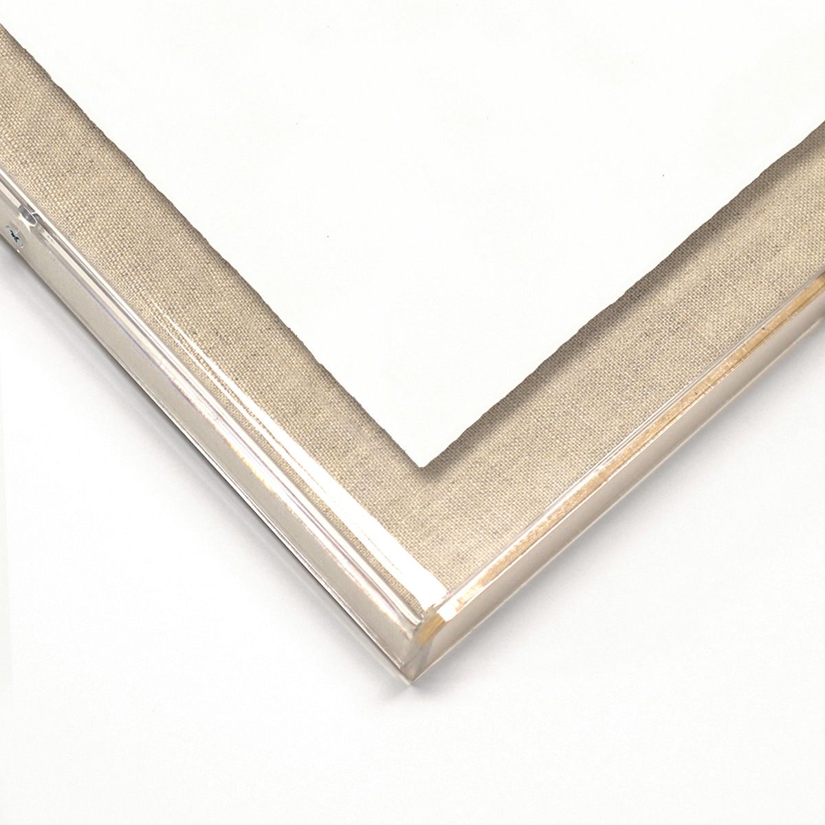 Close-up of a silver picture frame corner on a white background