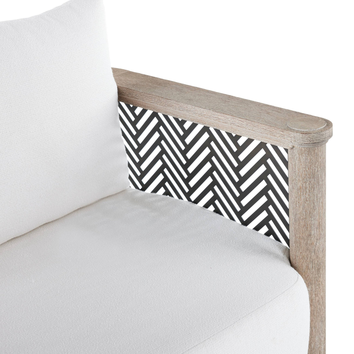 White sofa with a wooden armrest featuring a black and white geometric pattern on a white background