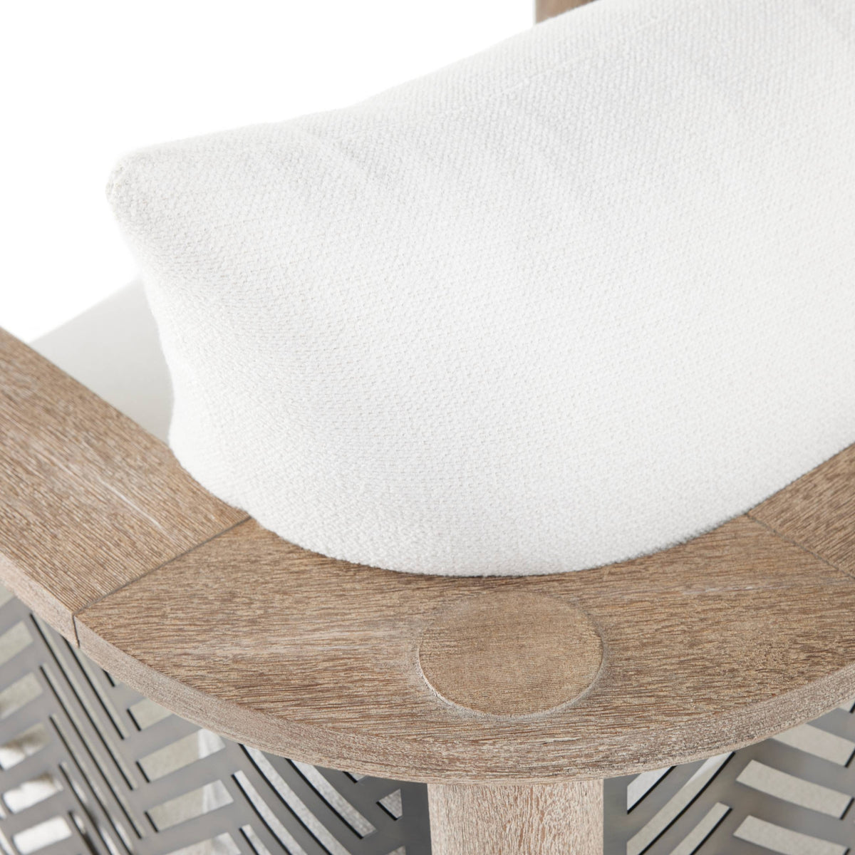 Wooden stool with a white cushion on a white background
