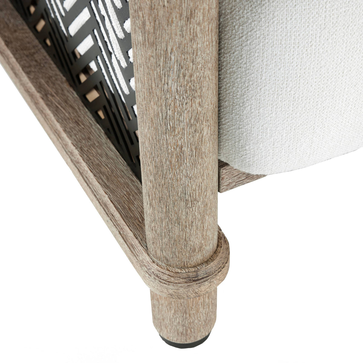 Close-up of a wooden chair leg with a white cushioned seat on a white background