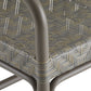 Close-up of a woven chair seat with a geometric pattern on a white background