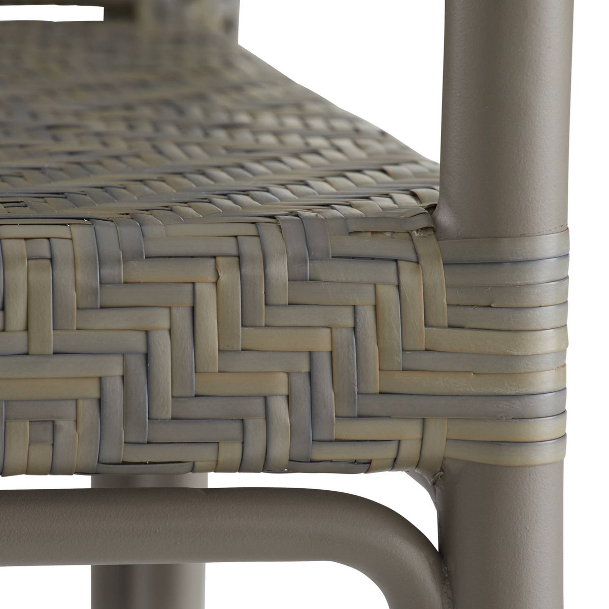 Close-up of a woven chair seat with a herringbone pattern on a white background