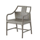 A modern outdoor dining chair with a gray metal frame and textured gray and beige woven seat and back cushions, shown on a plain white background.