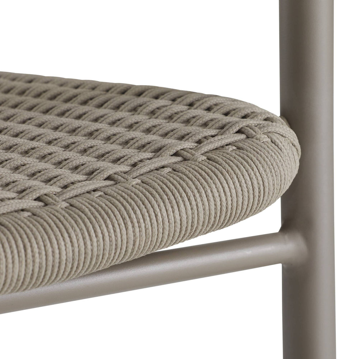 Close-up of a chair with woven seat and metal frame on a white background