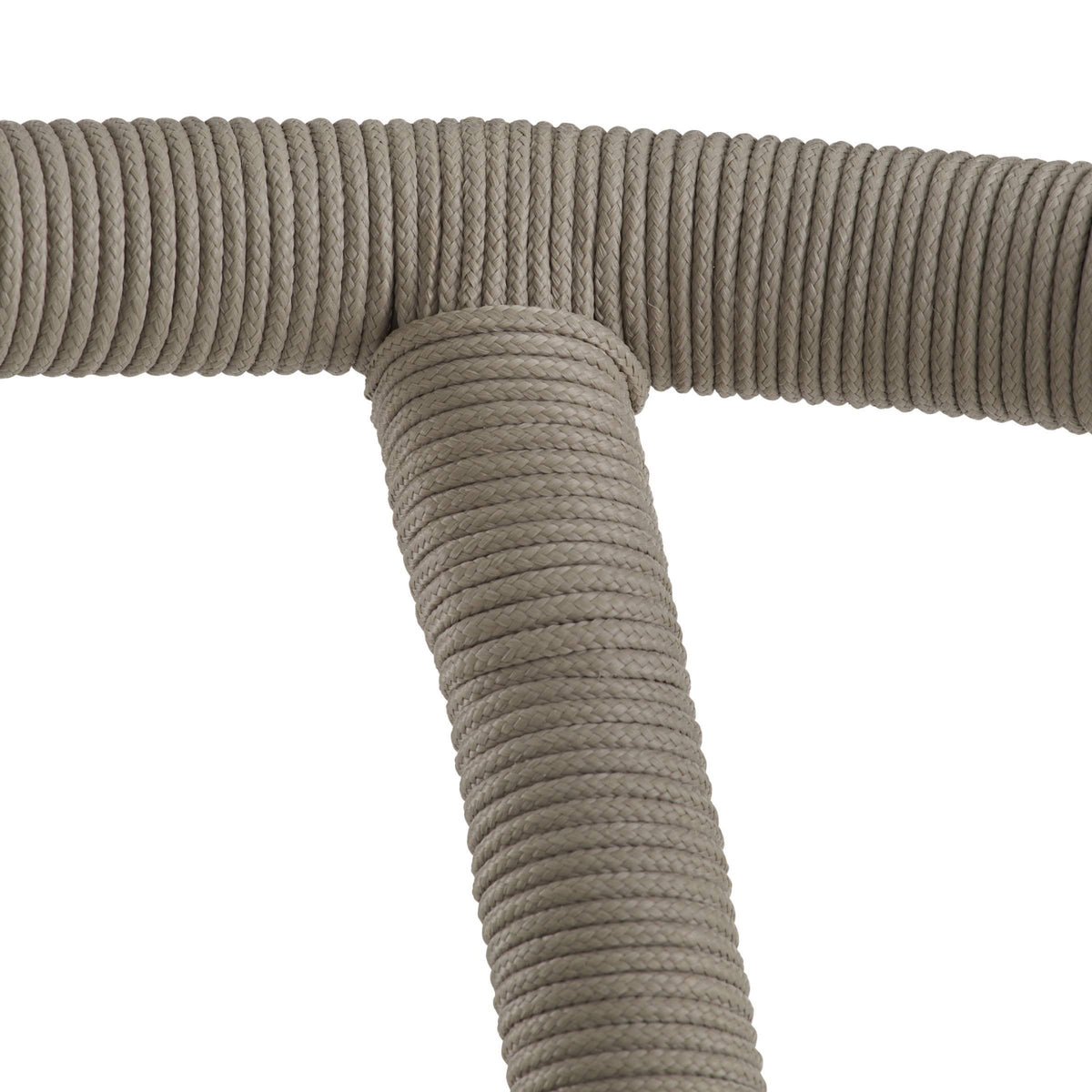 Close-up of a beige rope chair armrest on a white background