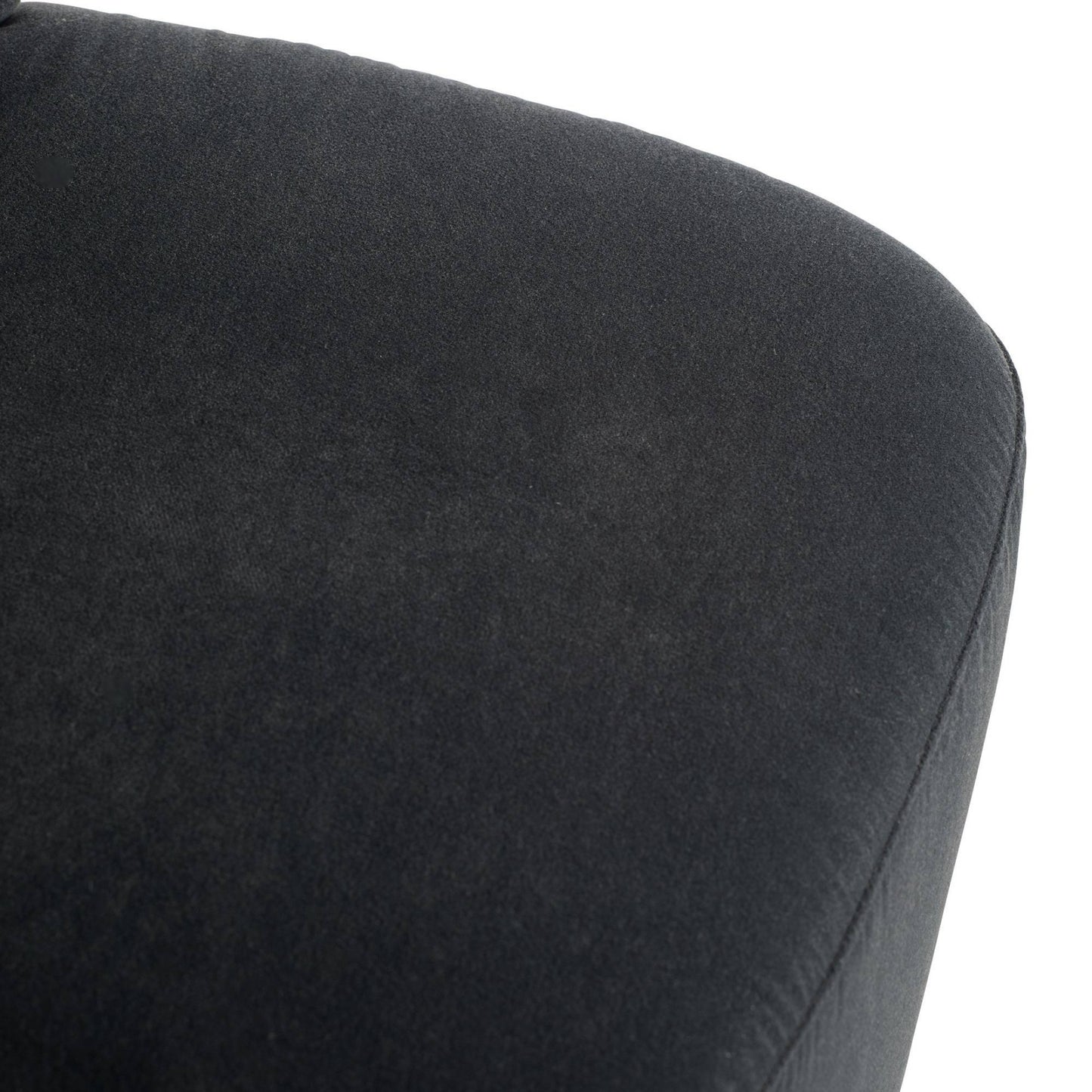 Close-up of a dark gray cushion on a chair with a white background