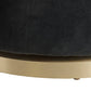 Dark gray cushioned stool with a gold base on a white background