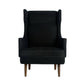 Black armchair with wooden legs on a white background