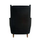 Black armchair with wooden legs on a white background