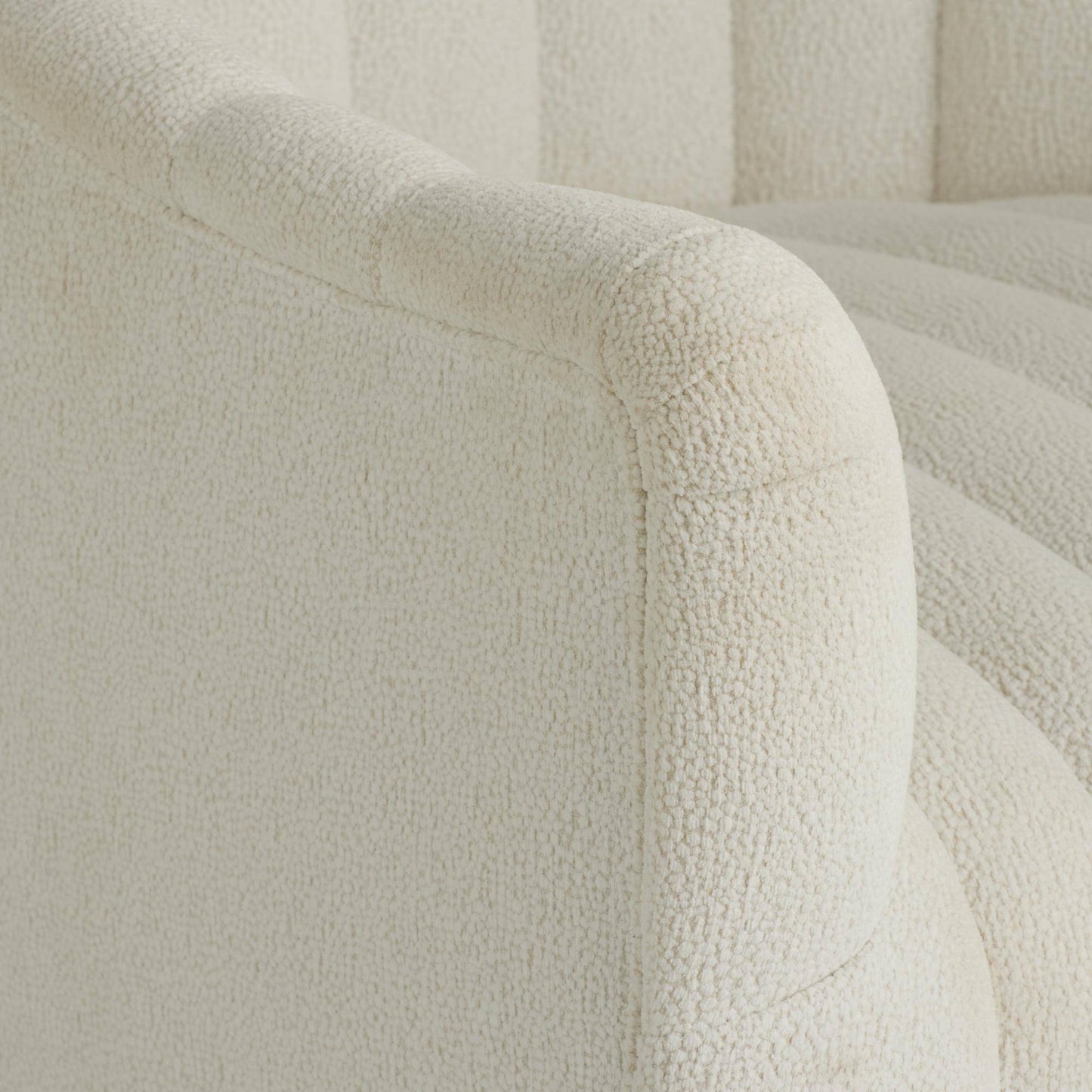Close-up of a textured beige fabric surface