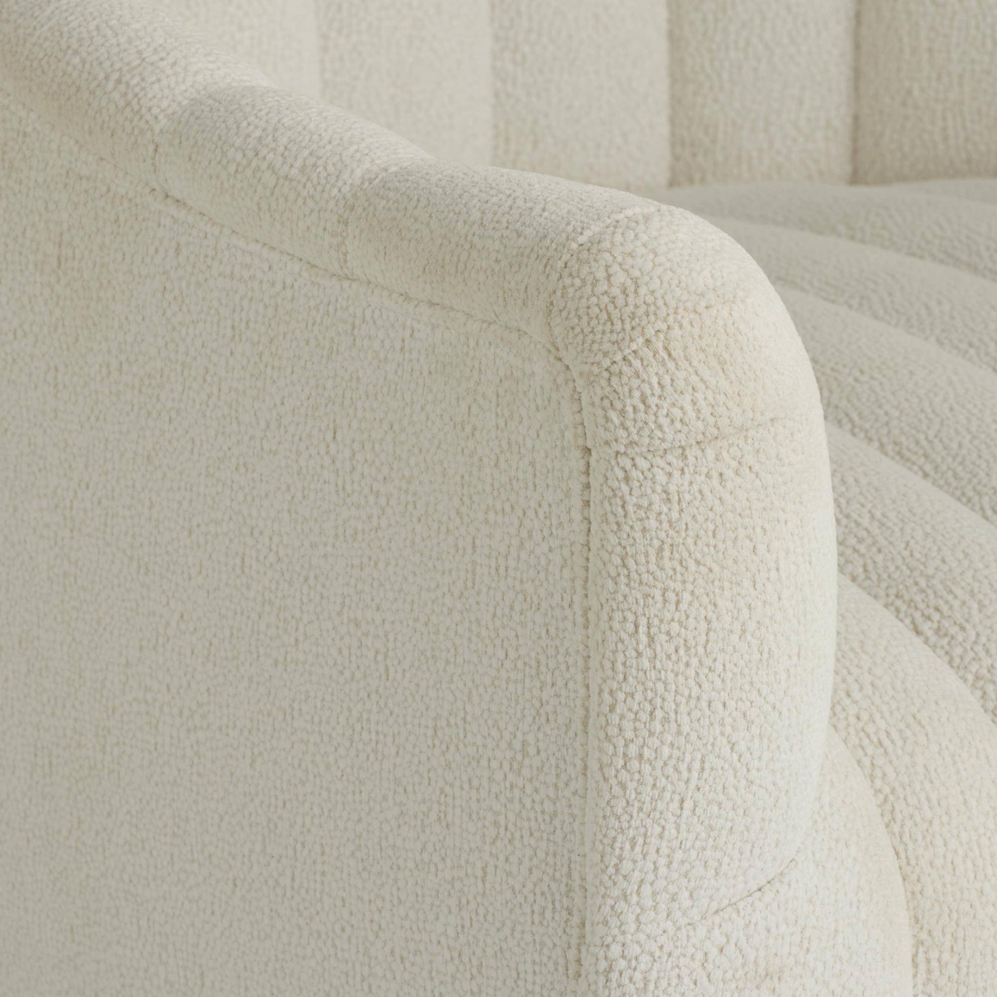 Close-up of a textured beige fabric surface